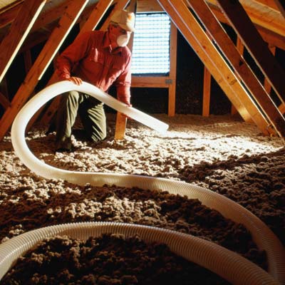 blowing insulation into an attic