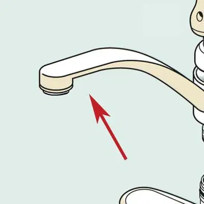 The spout of a kitchen faucet.