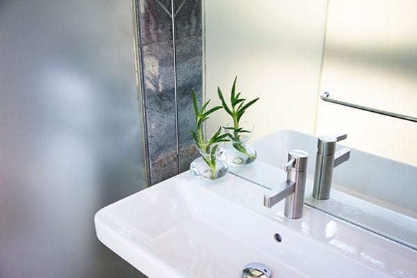 Use window film to add privacy to a glass shower.