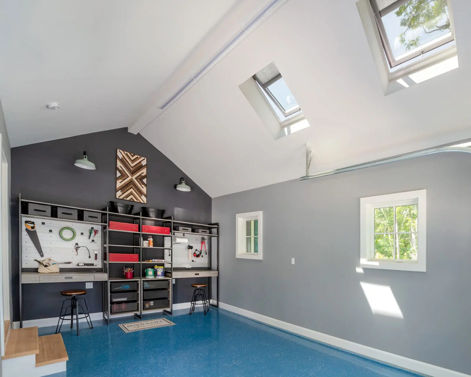 skylights and open windows letting in natural light in a work studio