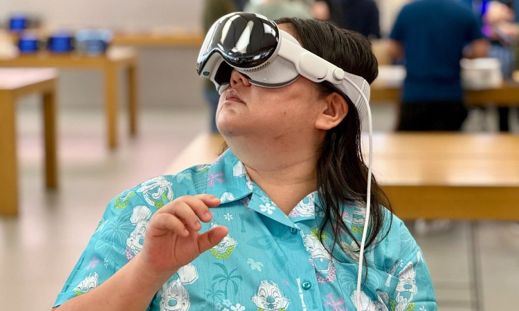 A person wearing the Apple Vision Pro demo unit in an Apple Store.