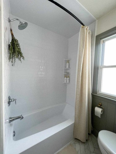 Shower with Bath Fitter tub and eucalyptus hanging