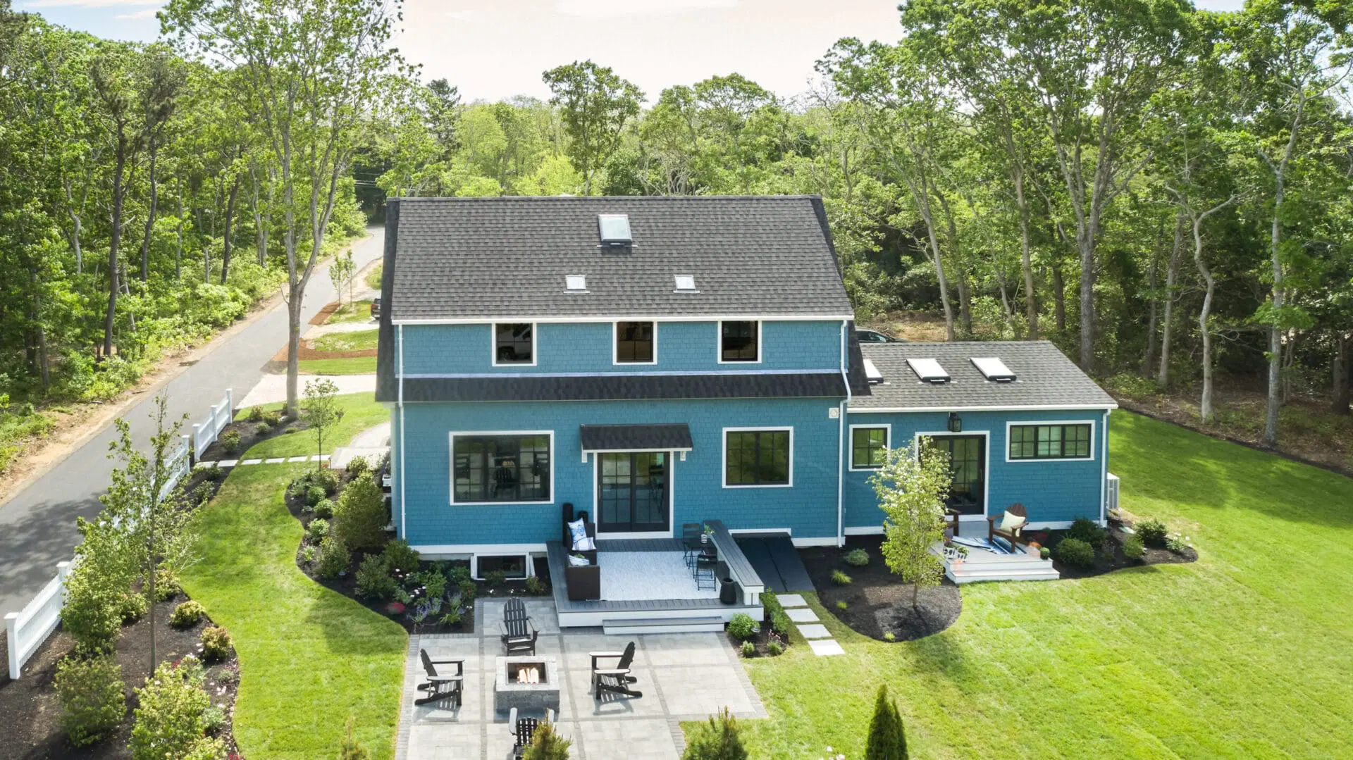 a view of a home that shows multiple skylights