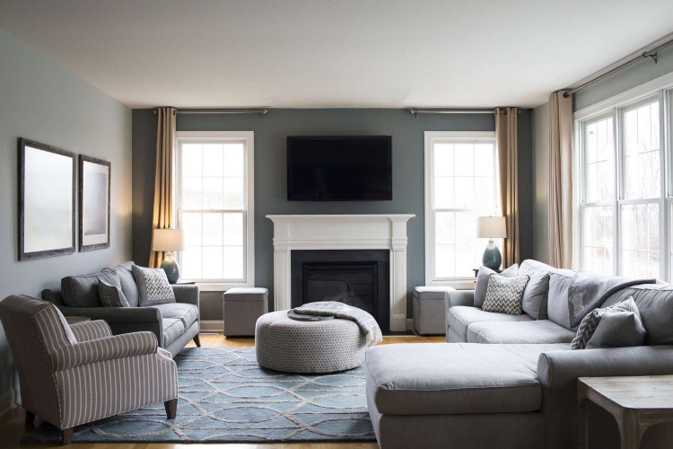 Gray living room with chairs and couch