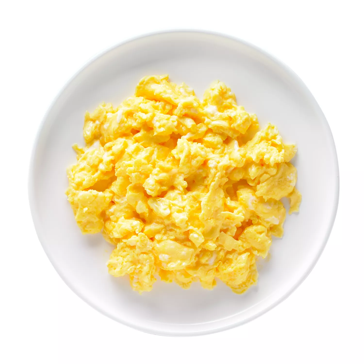 Scrambled eggs on a white plate.
