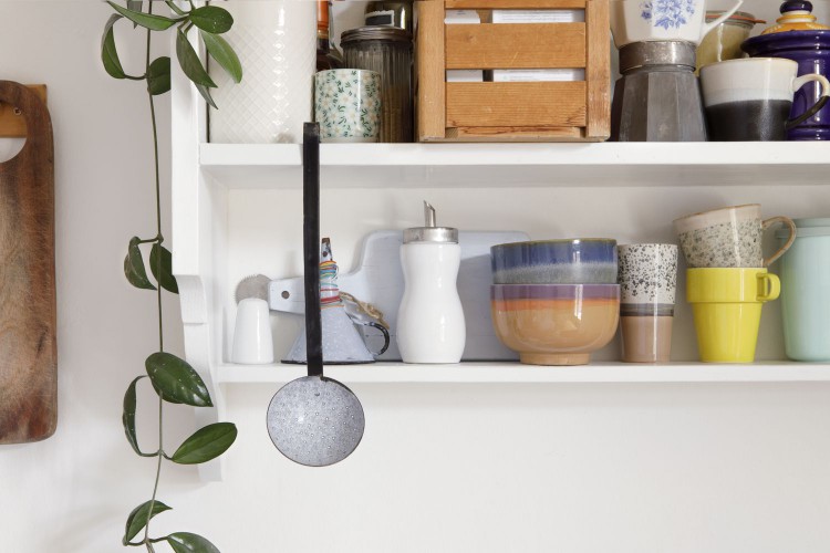 shelf filled with vintage kitchen items