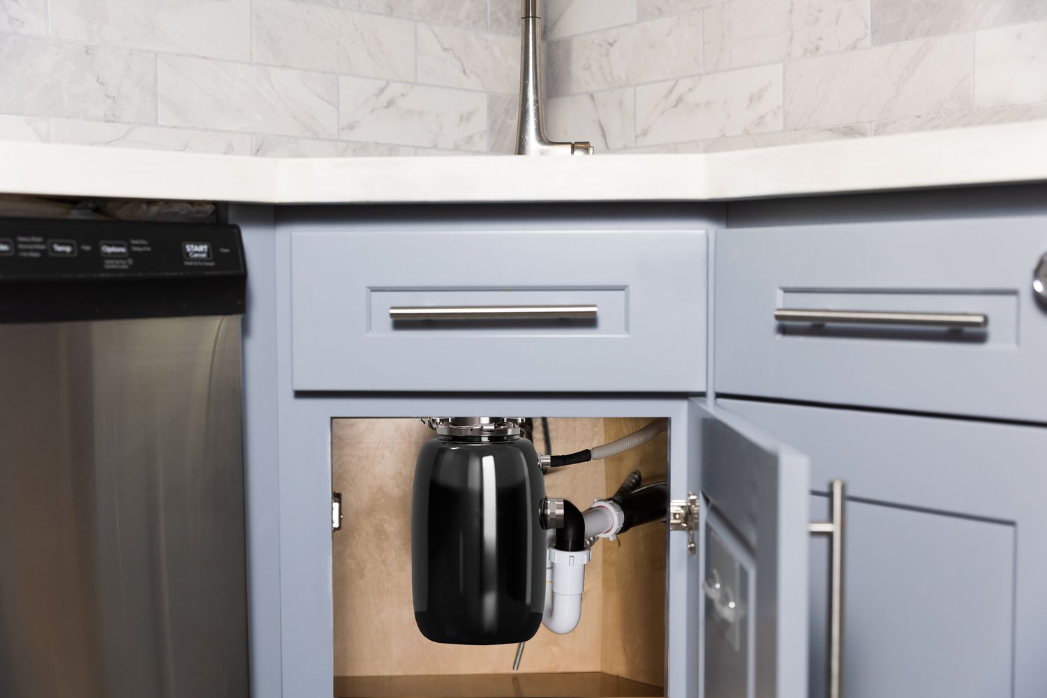 Garbage disposal installed in a kitchen