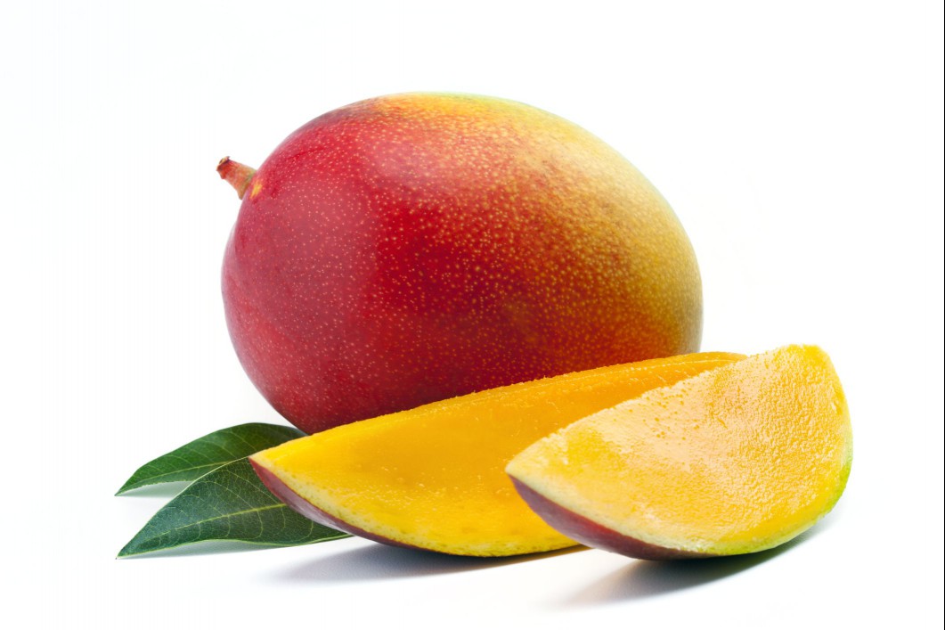 Mango with slices and leaves