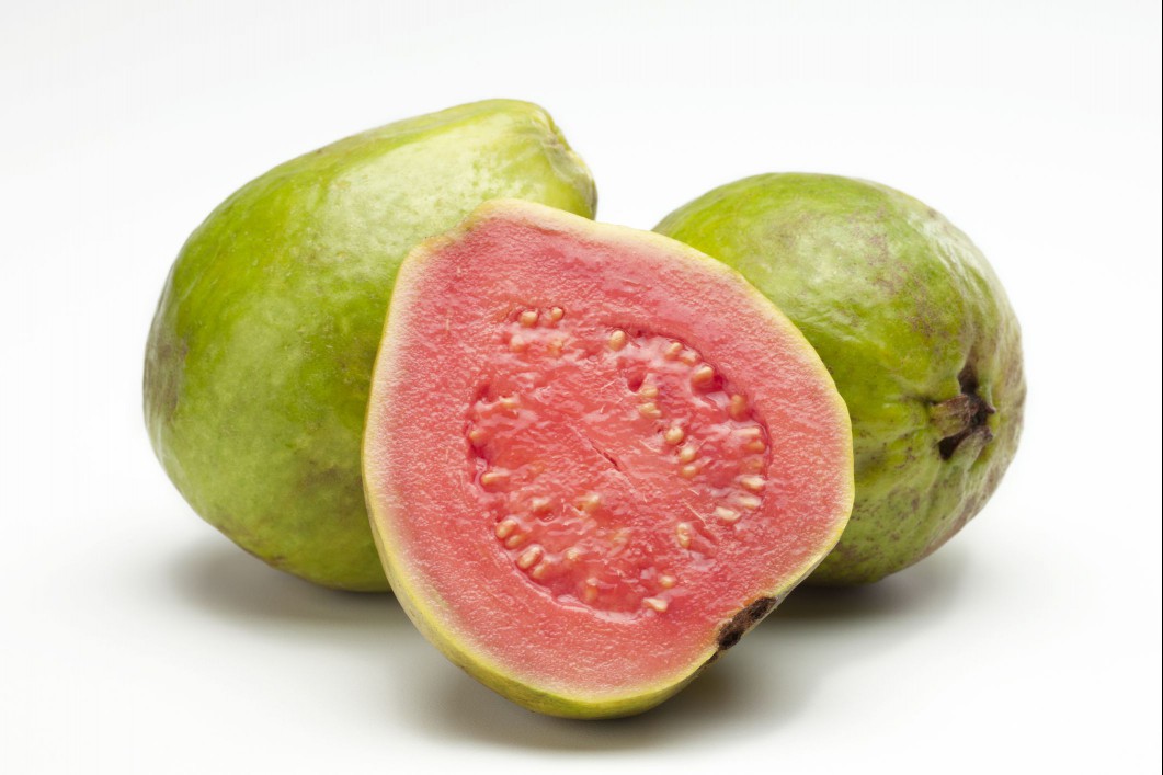 Guava fruit sliced in half.
