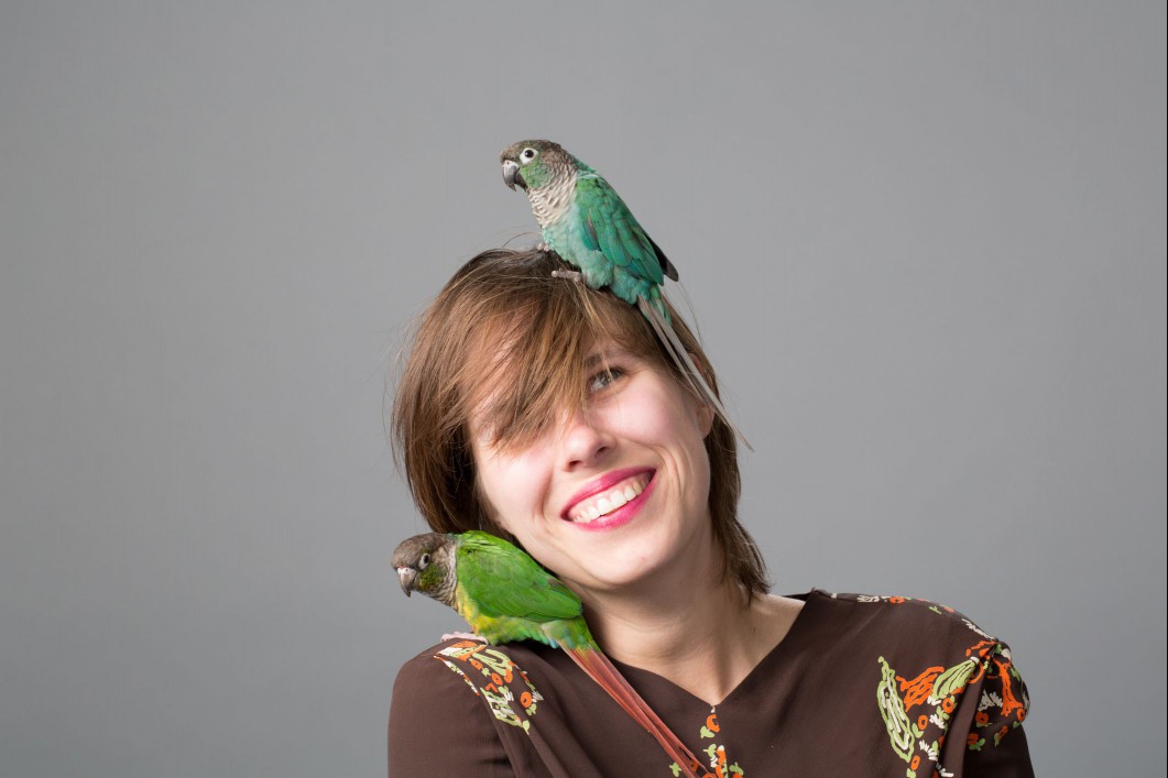 Woman with pet birds