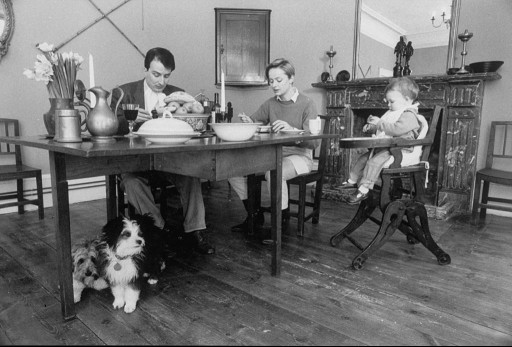 Performer Kit Hesketh Harvey, wife Katie, baby daughter Augusta and their two Tibetan Terriers having lunch at home