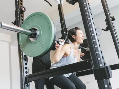 Woman doing Smith Machine Squats