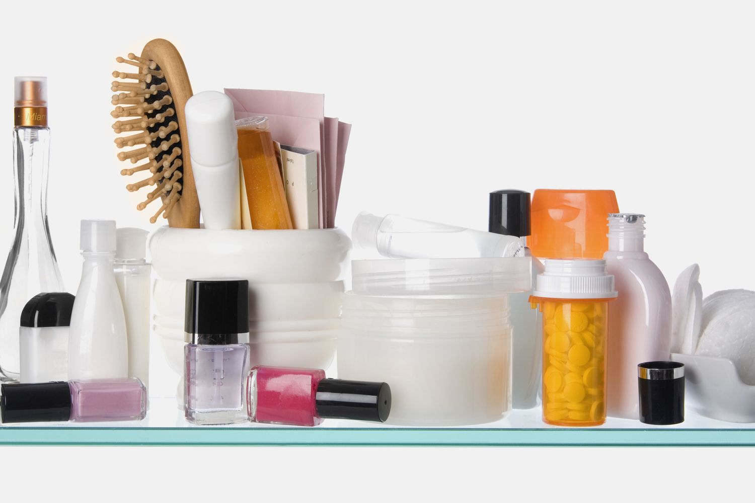 how to organize open shelves in a bathroom