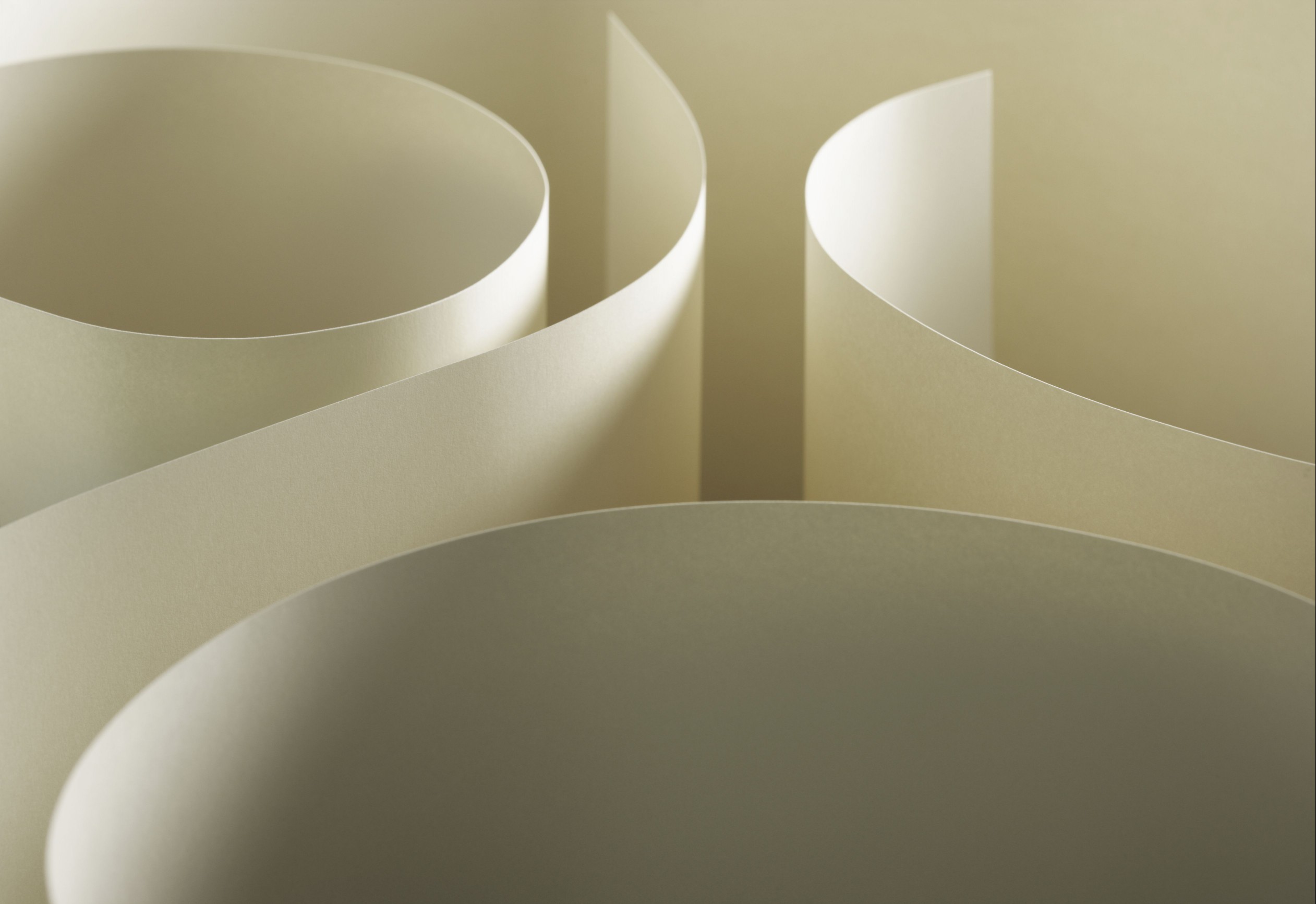 Three pieces of paper made to form a design