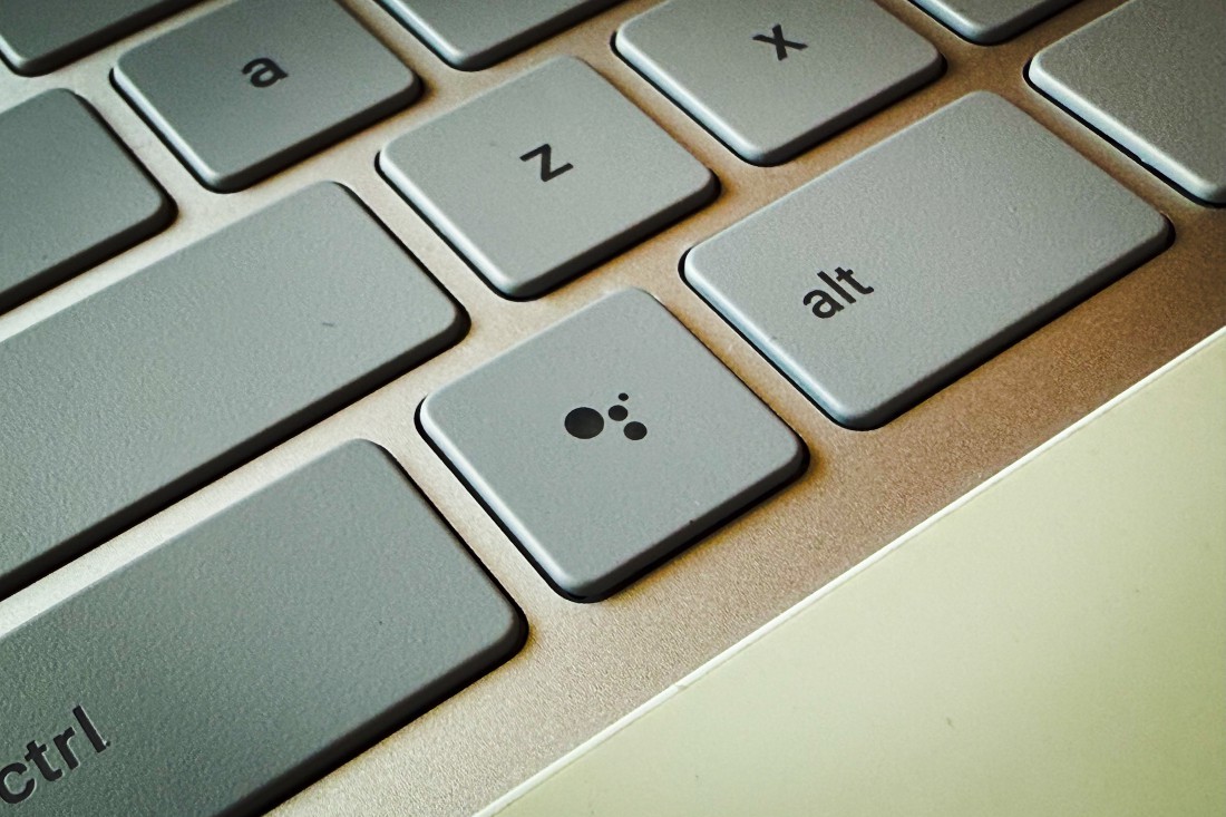 Dedicated Google Assistant button on Chromebook.