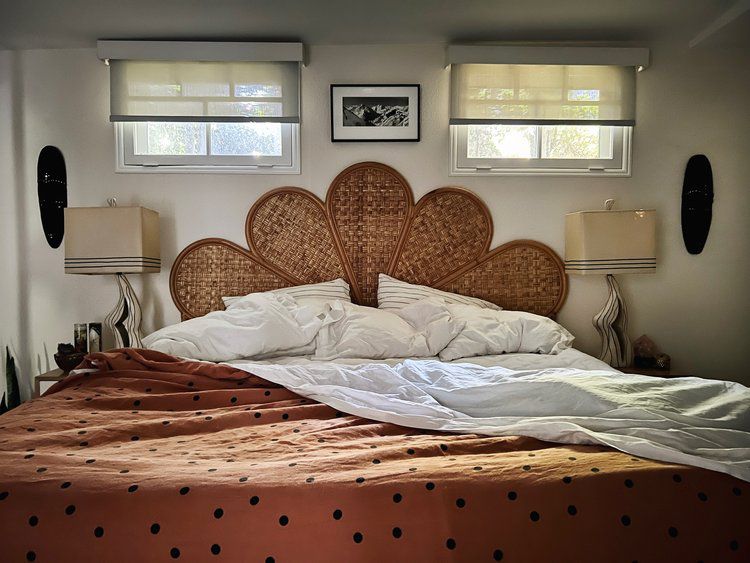 midcentury modern bedroom with rattan flower headboard
