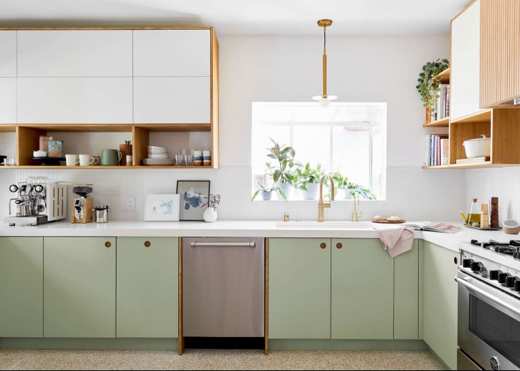 kitchen with green cabinets and light fixture