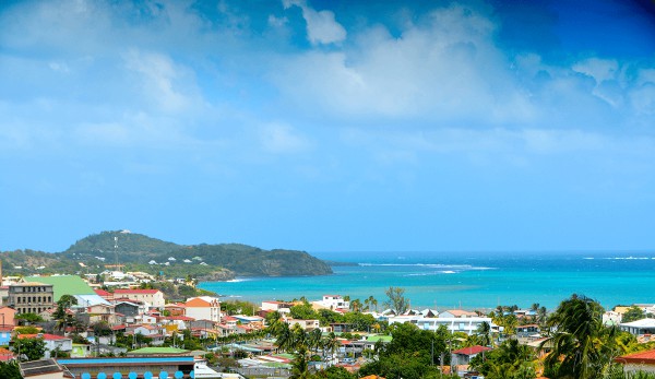 A photo of a city in Martinique along the water.