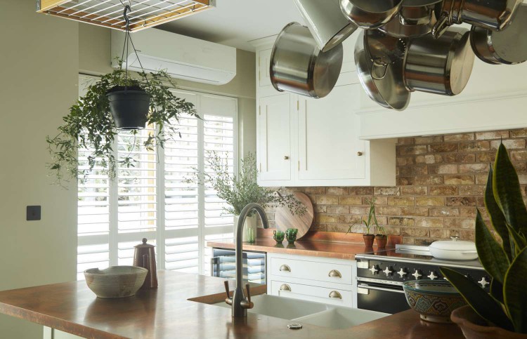 Olive & Barr Shaker Kitchen painted in Pointing with copper worktops 