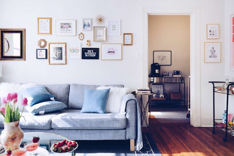 gold leaf gallery wall in living room