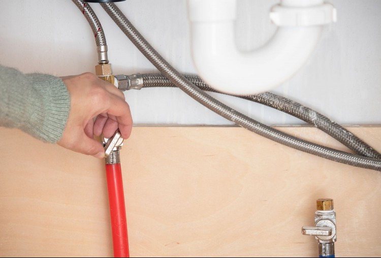 Turning plumbing fixtures back on