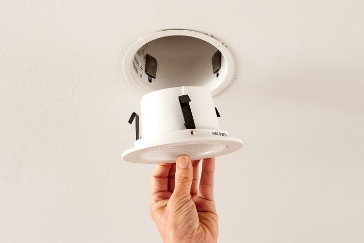 Adding the recessed light trim to the light fixture