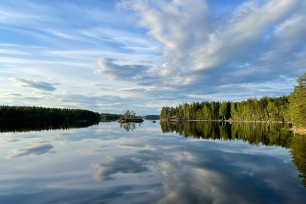 A photo of Lake Saimaa in Finland on a partially cloudy day.