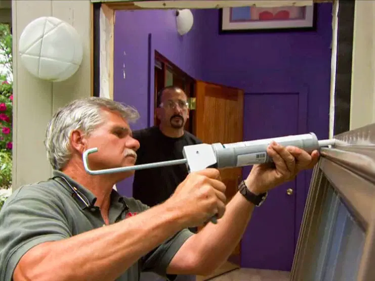 Apply Temporary Caulk to Drafty Windows