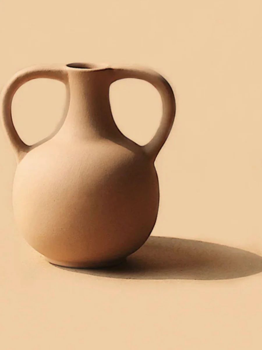 Earthenware vase by Domain by Laura Hodges Studio .