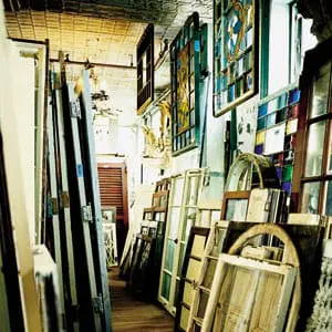Old windows and doors in a warehouse