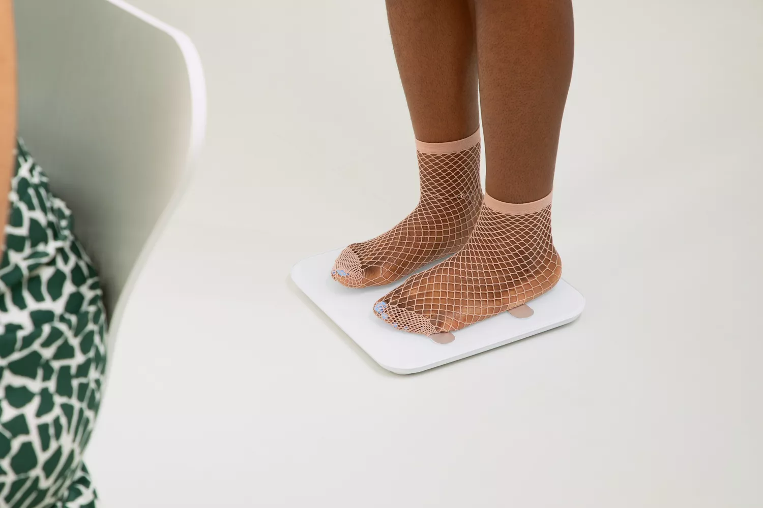 Person wearing mesh socks standing on Arboleaf Smart Scale CS20A