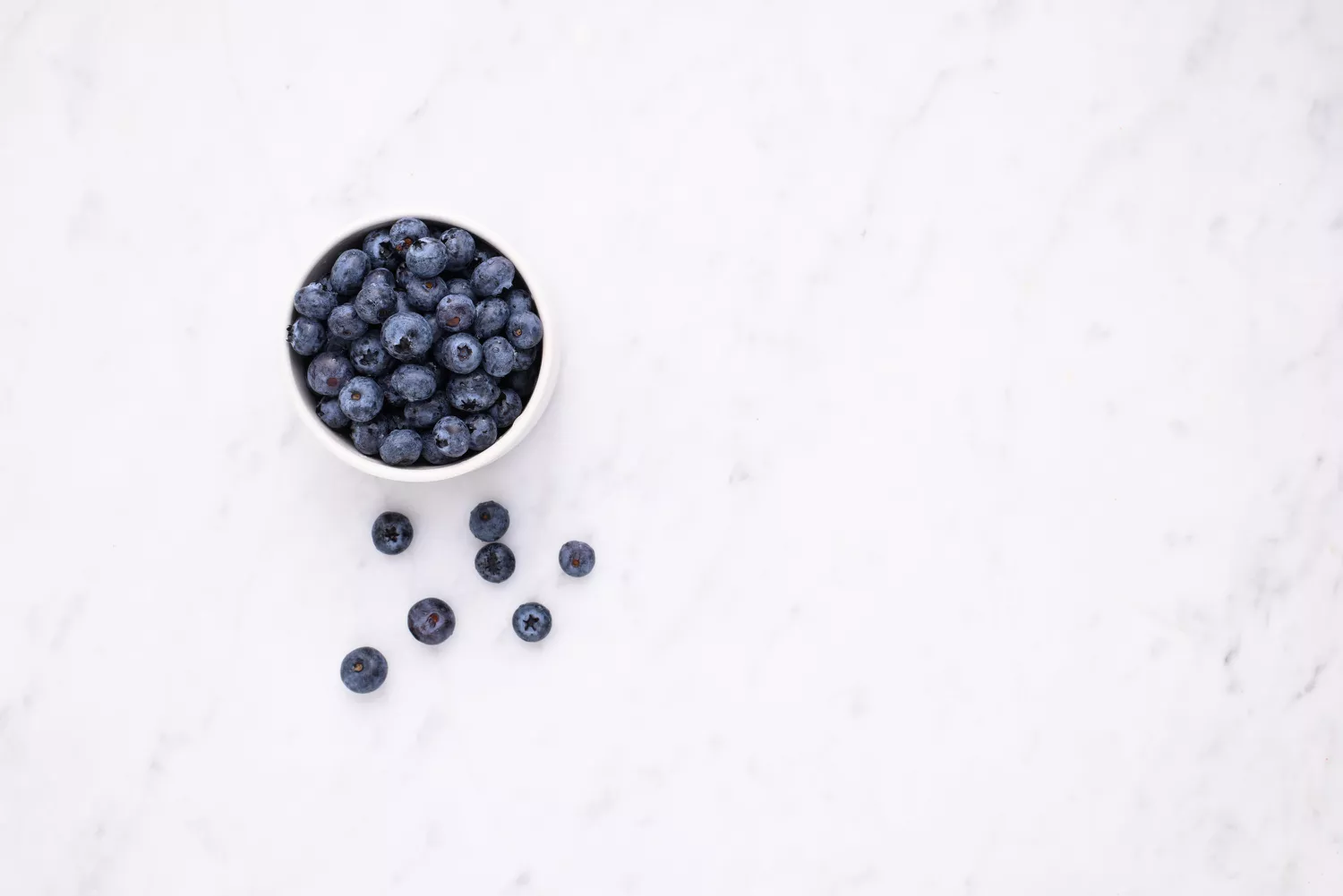 blueberries in a white ramekin