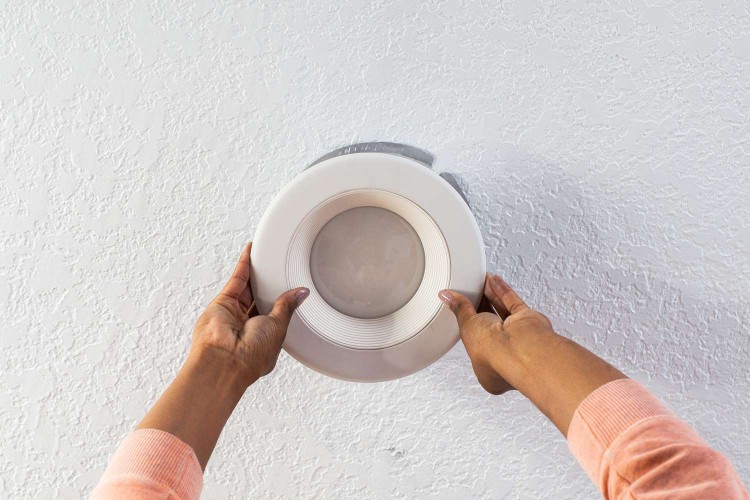 Recessed fixture installed into ceiling hole