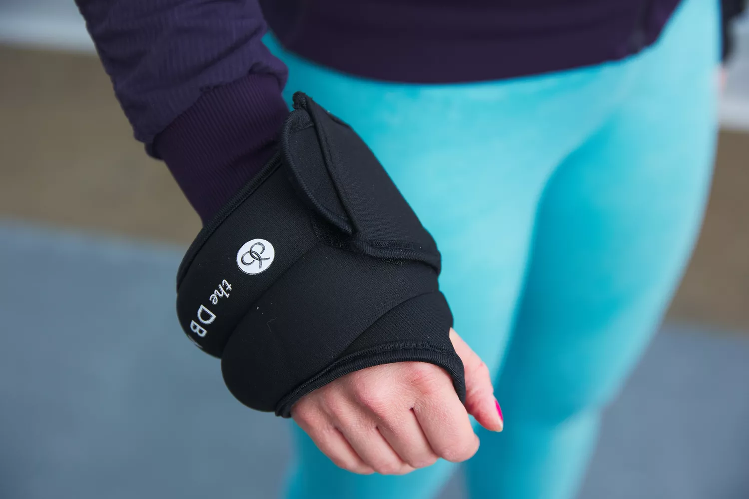 A person wears The DB Method The Dreamlets around their wrist 