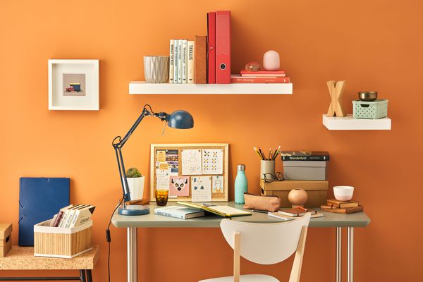 Home office with a desk and floating shelves