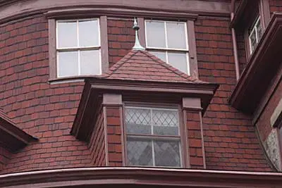 A house with leaded dormer windows.