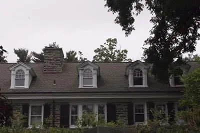 A house with pedimented palladian dormer windows