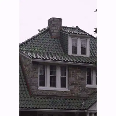 Image of a shed-on-shed dormer which can create a unique and functional roofline on a house