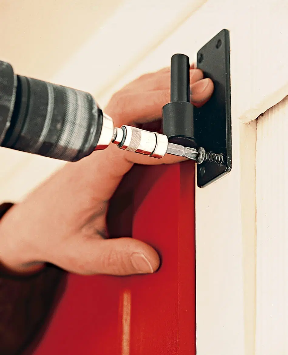 drilling in the hinges for the shutters