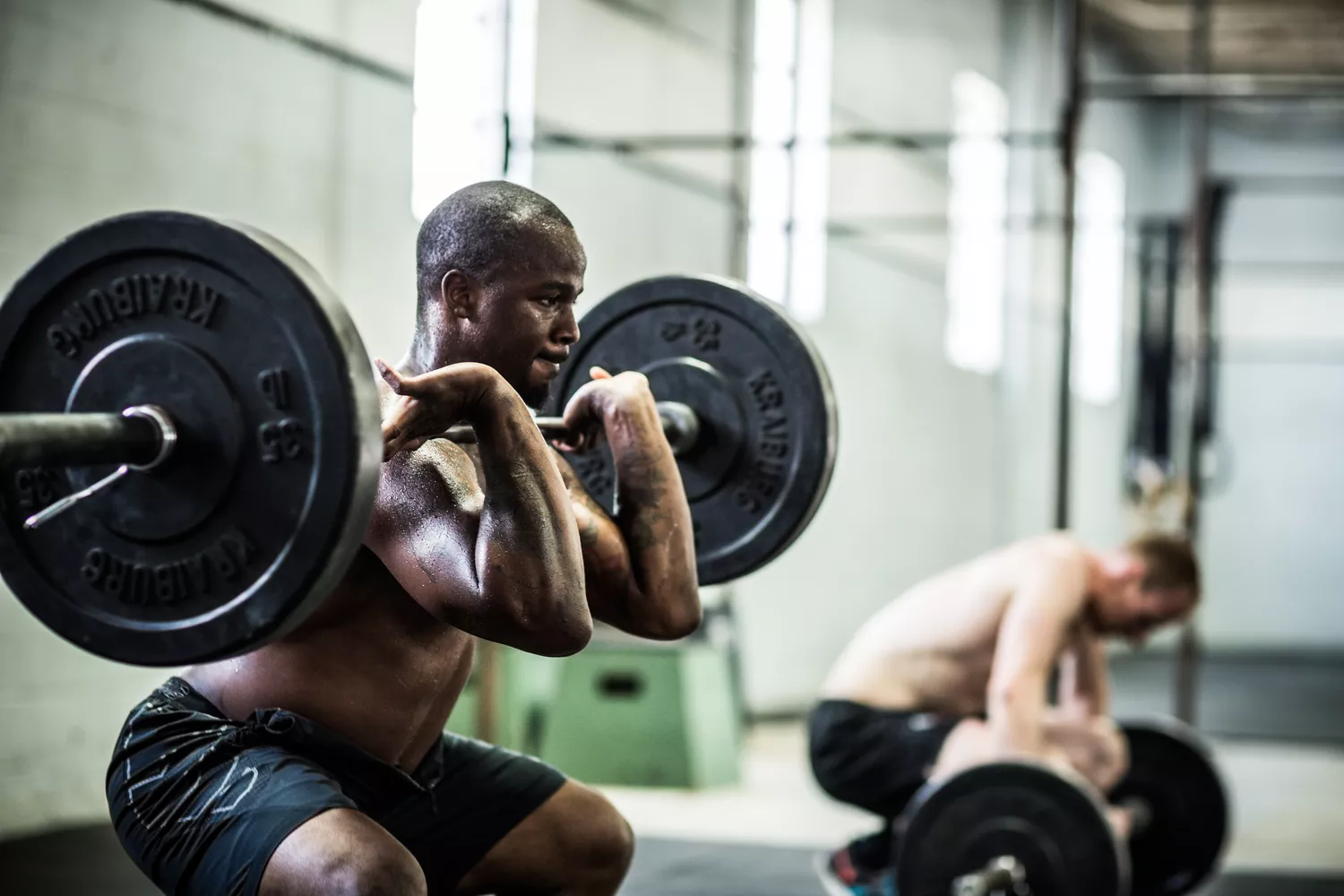 gym - Men doing front squats