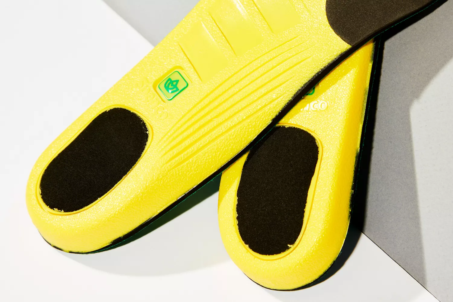 Closeup of the heels of Spenco PolySorb Cross Trainer Insoles