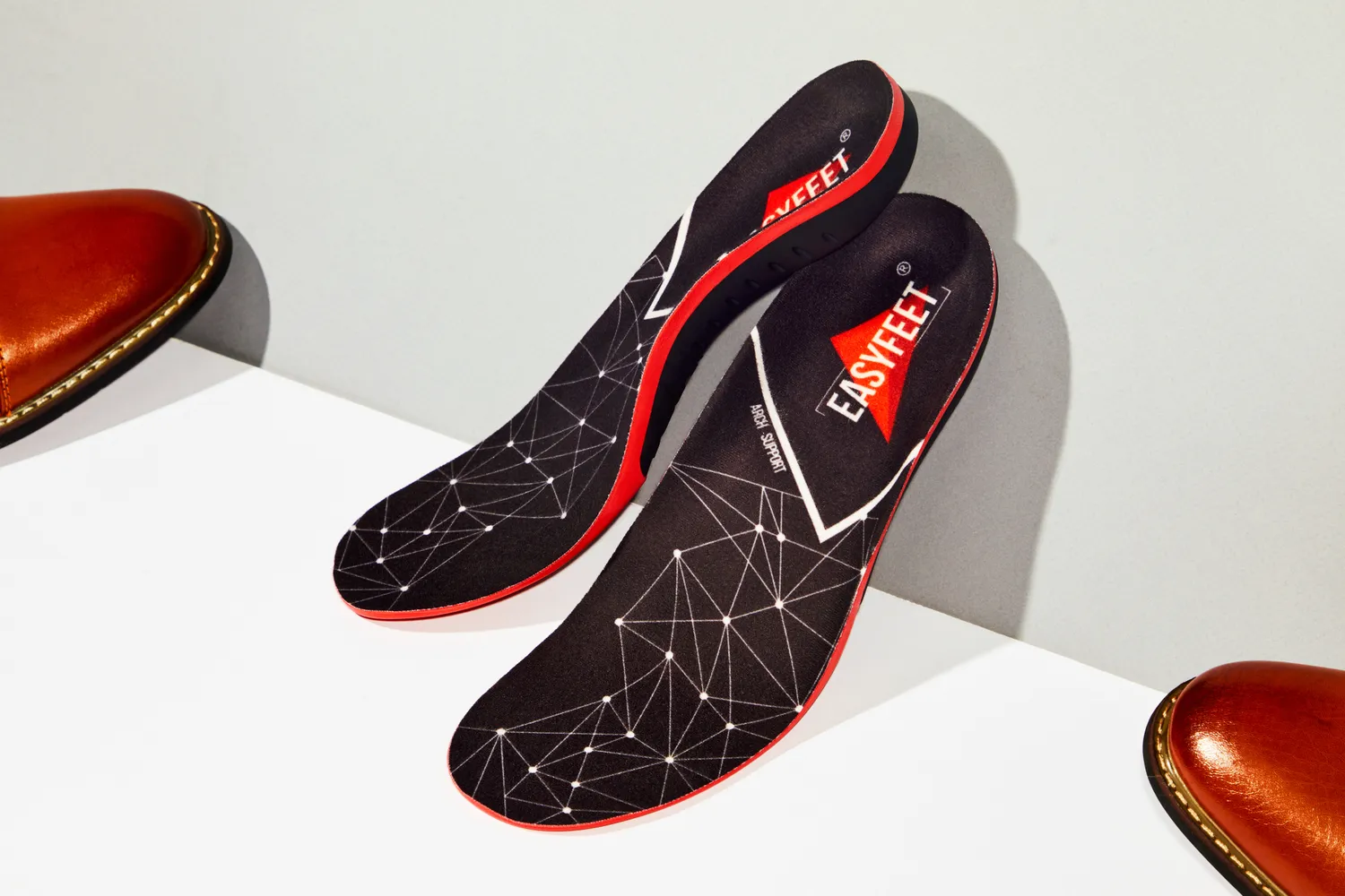 EasyFeet Plantar Fasciitis Arch Support Insoles displayed on a white and gray surface