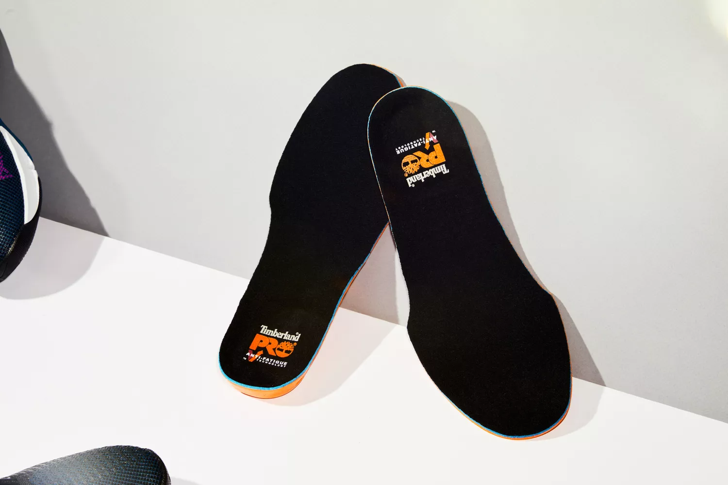 Timberland Pro Anti-Fatigue Technology Insoles displayed on a white and gray surface