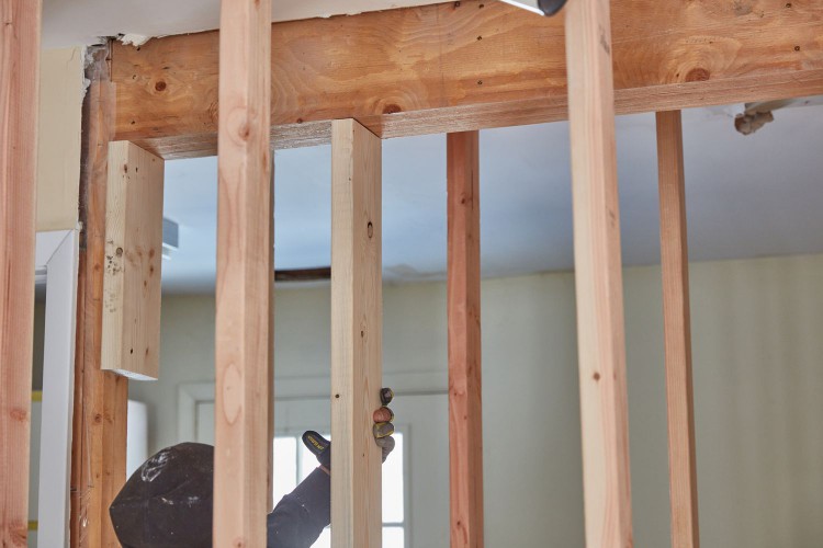Wooden support beams exposed in renovated house