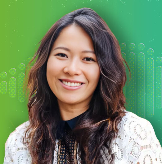 headshot of author in front of a green background