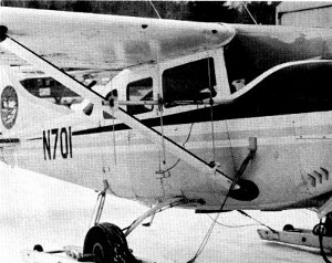 Figure 13.—Directional yagi antennas fastened to the wing struts of the aircraft were necessary to "home in" on the wolves. (Photo courtesy of U.S. Bureau of Sport Fisheries and Wildlife.) Figure 13.—Directional yagi antennas fastened to the wing struts of the aircraft were necessary to "home in" on the wolves. (Photo courtesy of U.S. Bureau of Sport Fisheries and Wildlife.)