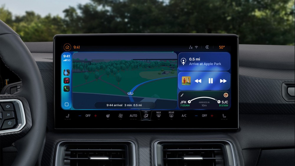 A car head unit with navigation instructions on the left and Live Activities on the right.