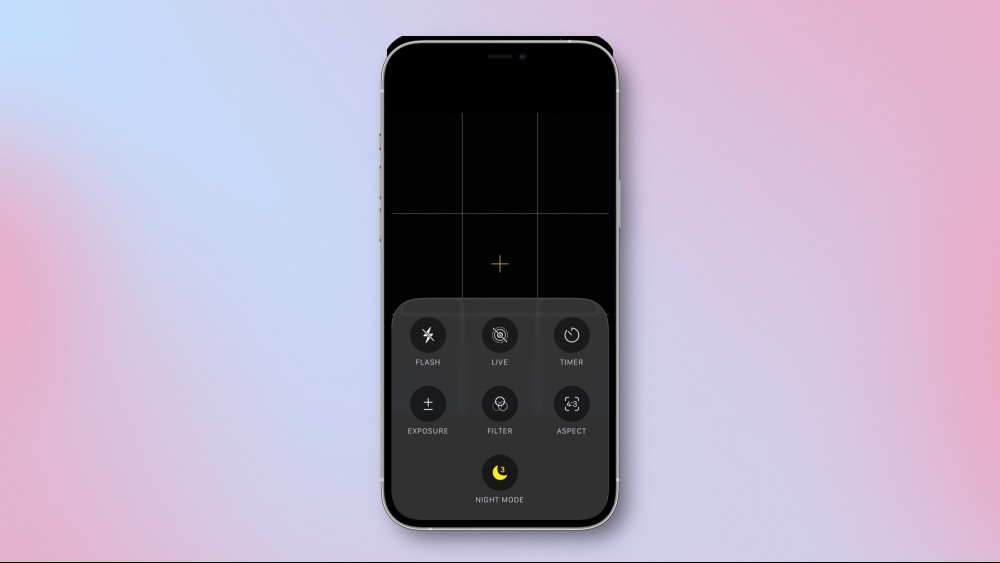 The Camera app in iOS 26 with Photos tweaks.