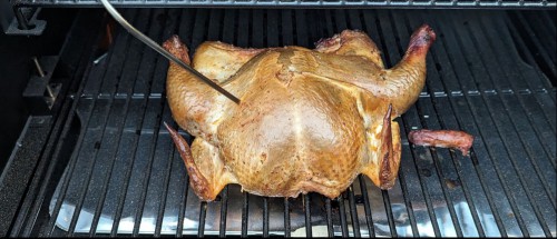 Spatchcocked chicken on a Brisk It Origin 580