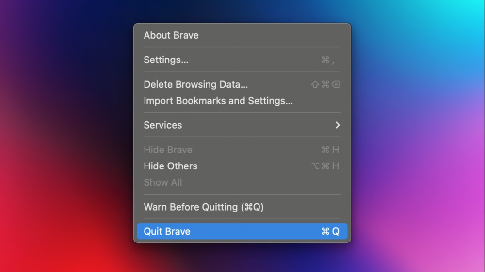 The options that show up when you click the Brave menu with the app open on a Mac, with the Quit option highlighted.